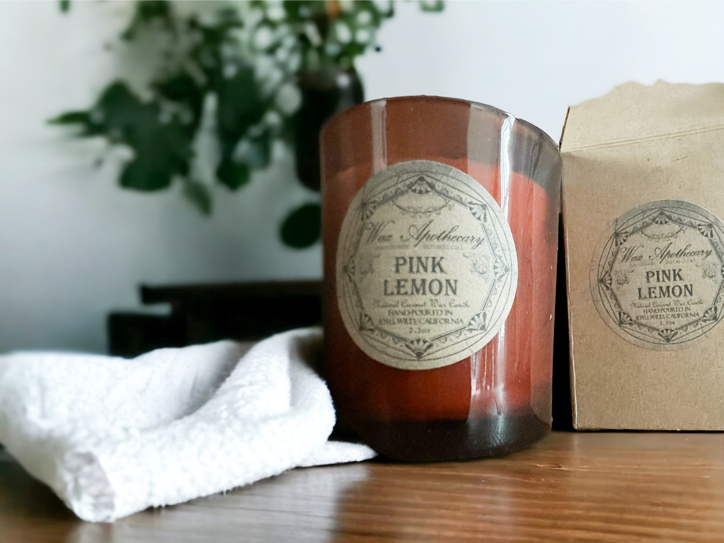 Scent: Pink Lemon Dark Amber Glass Botanical Candle in Pink Lemon Scent