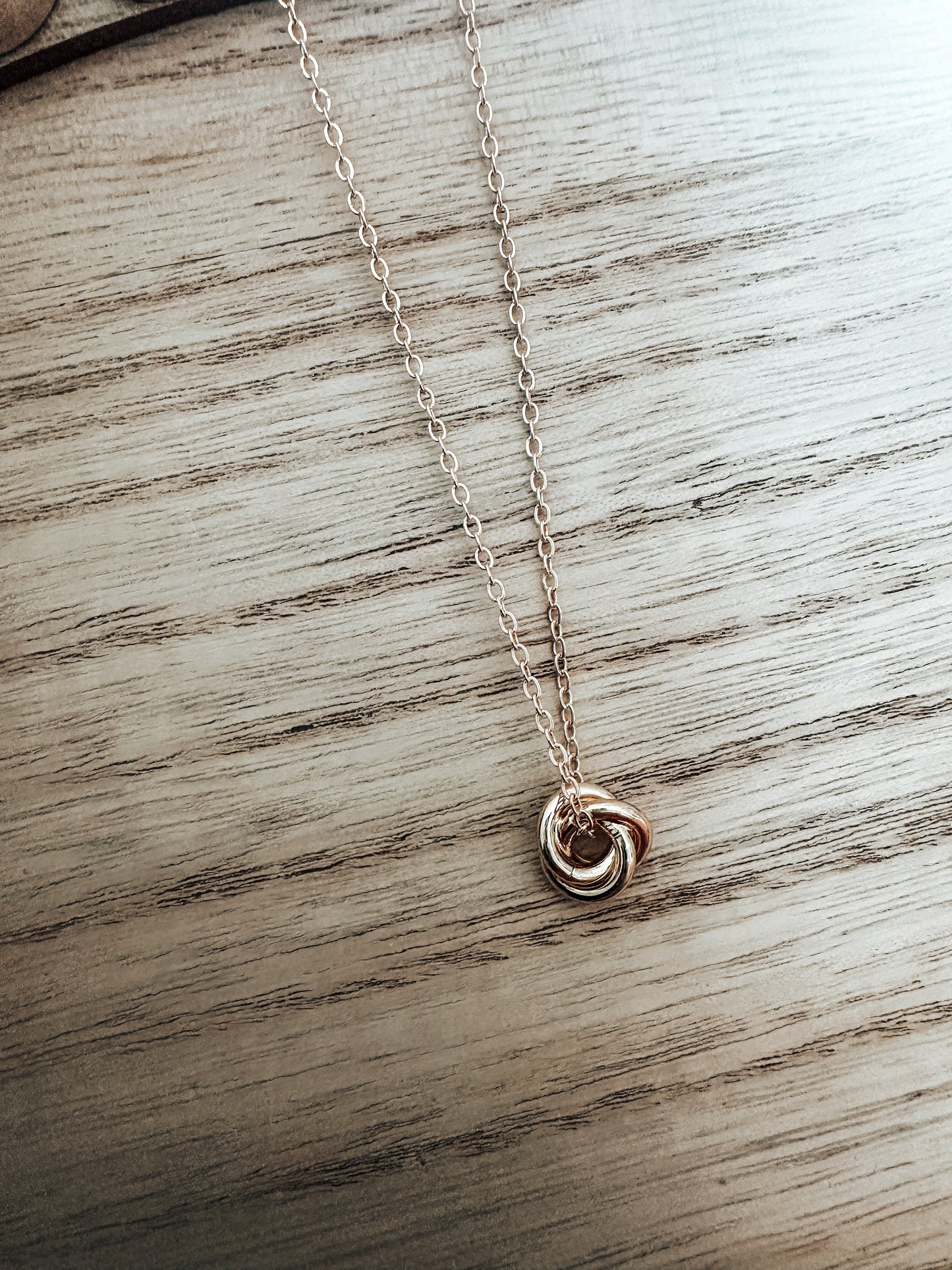 Gold knot necklace