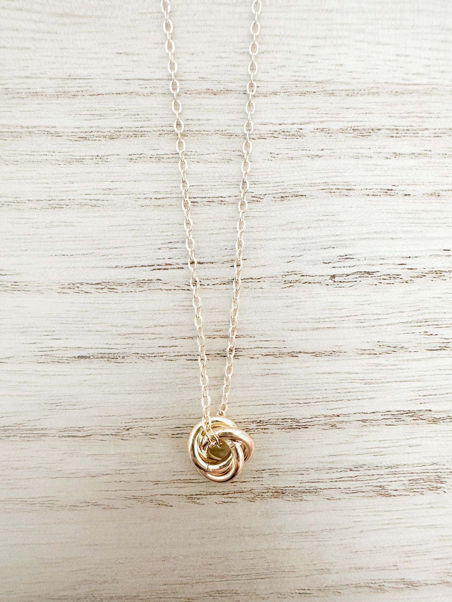 Gold knot necklace