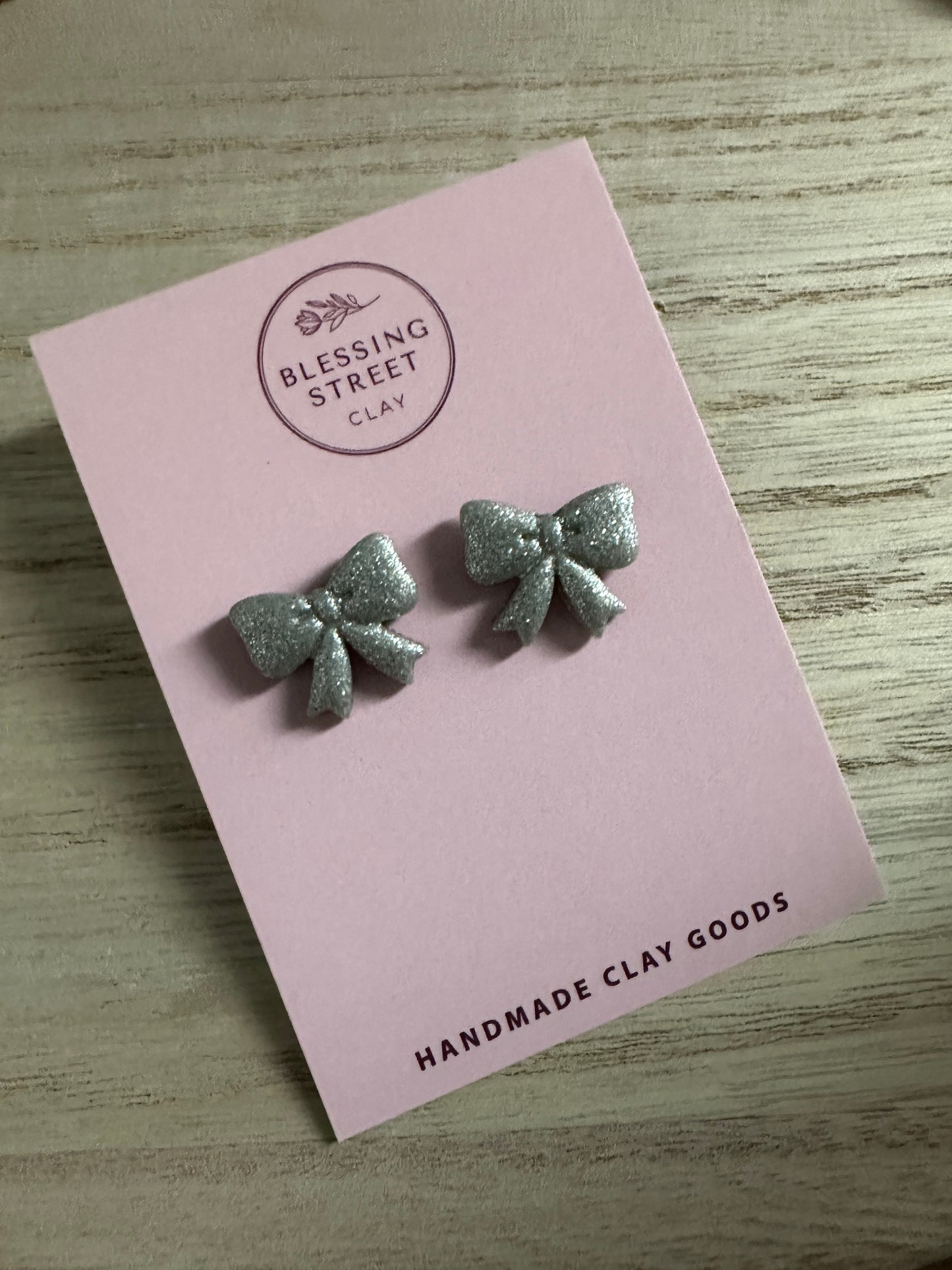 Christmas stud earrings - Silver Bow