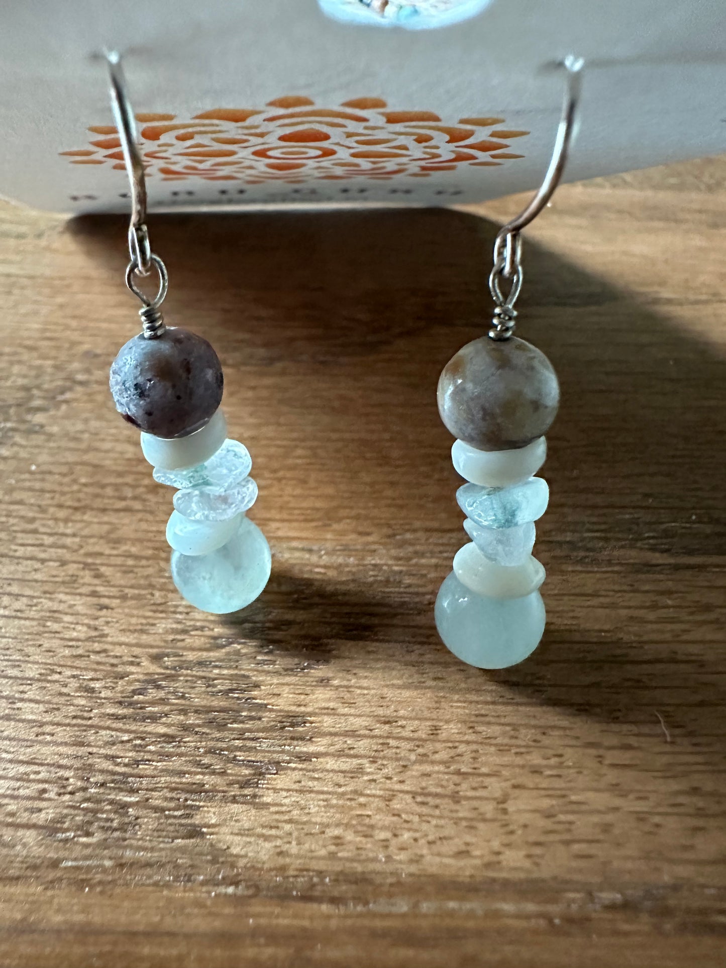 Fluorite and puka earrings