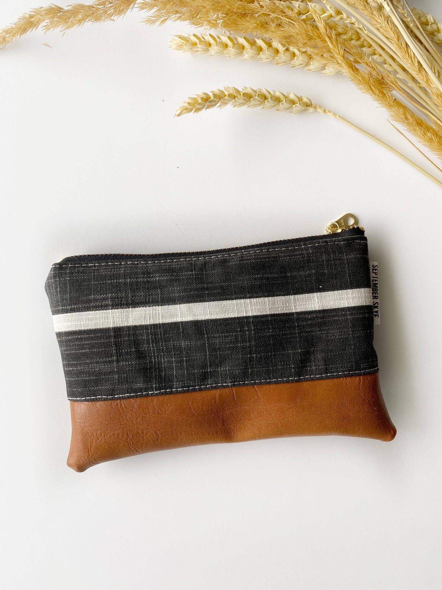 Coin purse wristlet in black and white striped farmhouse